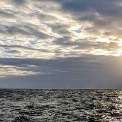 Enjoying the lights on the clouds