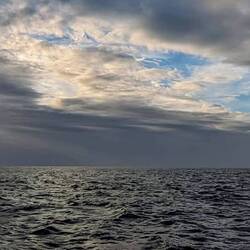 Enjoying the lights on the clouds