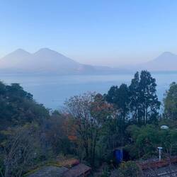 Sunrise over Lake Atitlan. L to R: Volcanoes Atitlán (3537m), Tolimán (3158m) & San Pedro (2995m)
