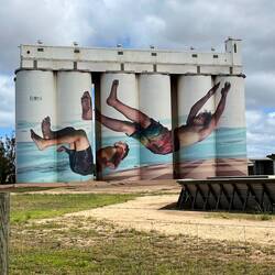Silo art. The painter based the work on local boys jumping off the jetty