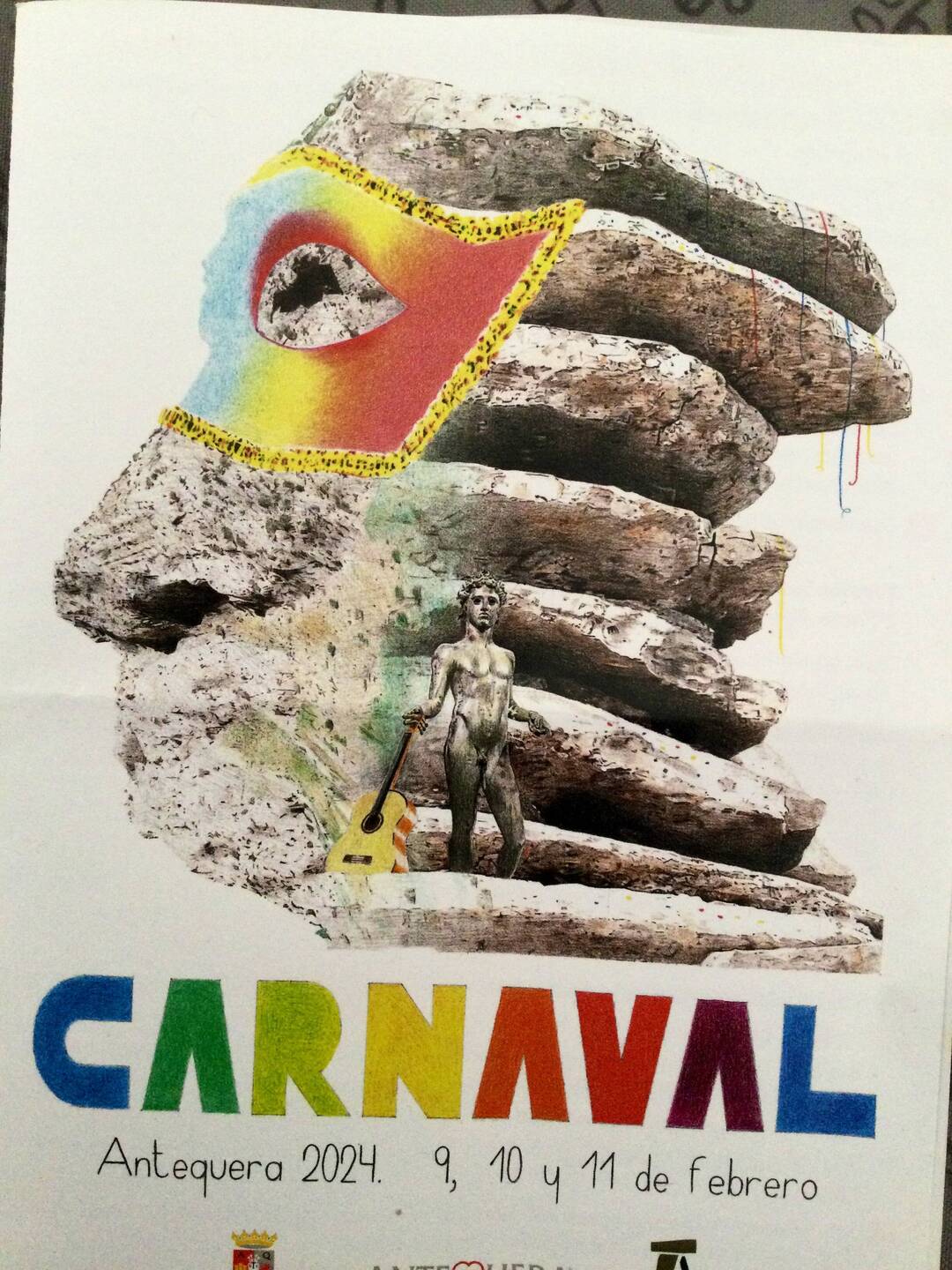 The attractive Carnaval poster. I can even see the tombs.