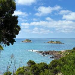 Three Sisters - rock islands but one is submerged