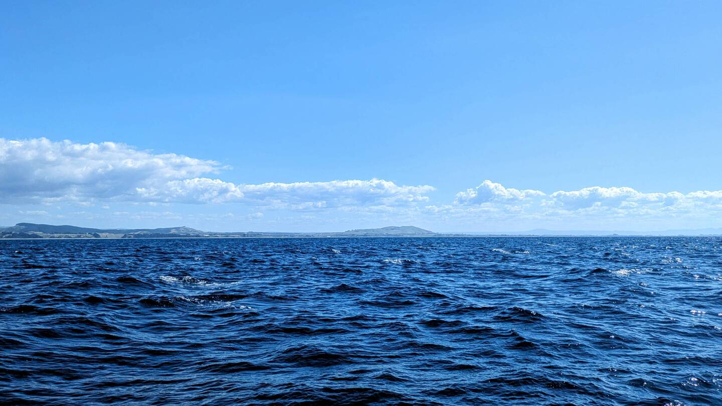 Sailing past Pukehina
