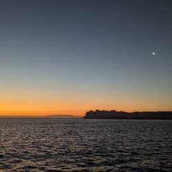 Crescent moon over Mount Maunganui