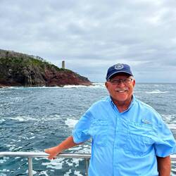 Myron with Ben Boyd Tower behind him.