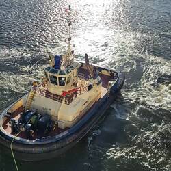 One of our favorite departure events...tugging the ship out to sea