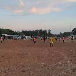 Watching football in the slums