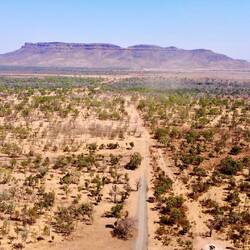 Arid, dusty landscape and Houseroof Hill