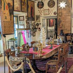 A room full of posters, many of them bullfighting posters.