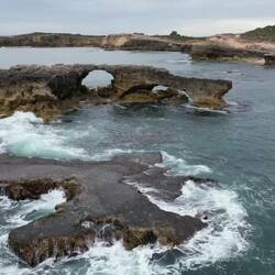 (Video) Took the drone for a fly *through* an amazing rock formation out to sea