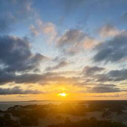 The sunset over Lamu Island observed from the sand dunes near Sheila town