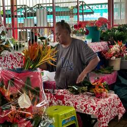 Numerous flower vendors at the market
