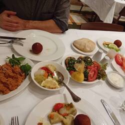 Dinner at Fakhreldin: Mouhamara, pickled artichoke salad, fried eggplant, and chicken balls