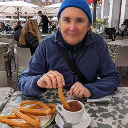 Eating churros and hot chocolate