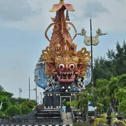 Round about statue. Eyes conceal cameras.