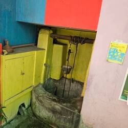 Common water source in Rainbow Village. They boil the water.