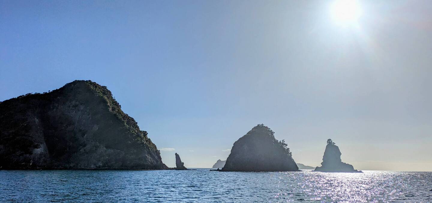 Jagged rock formation leaving Matapoua Bay