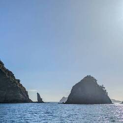 Jagged rock formation leaving Matapoua Bay