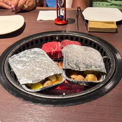 Our food is on the grill.