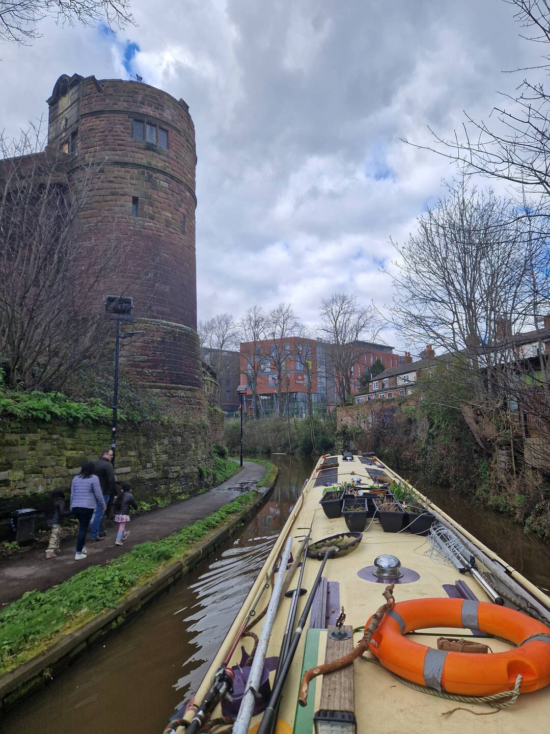Passing one of the red sandstone towers in Chester's walls