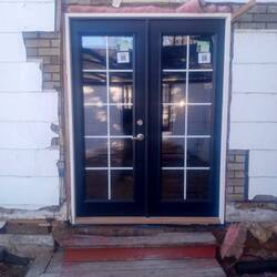 Patio doors on the side of the house.