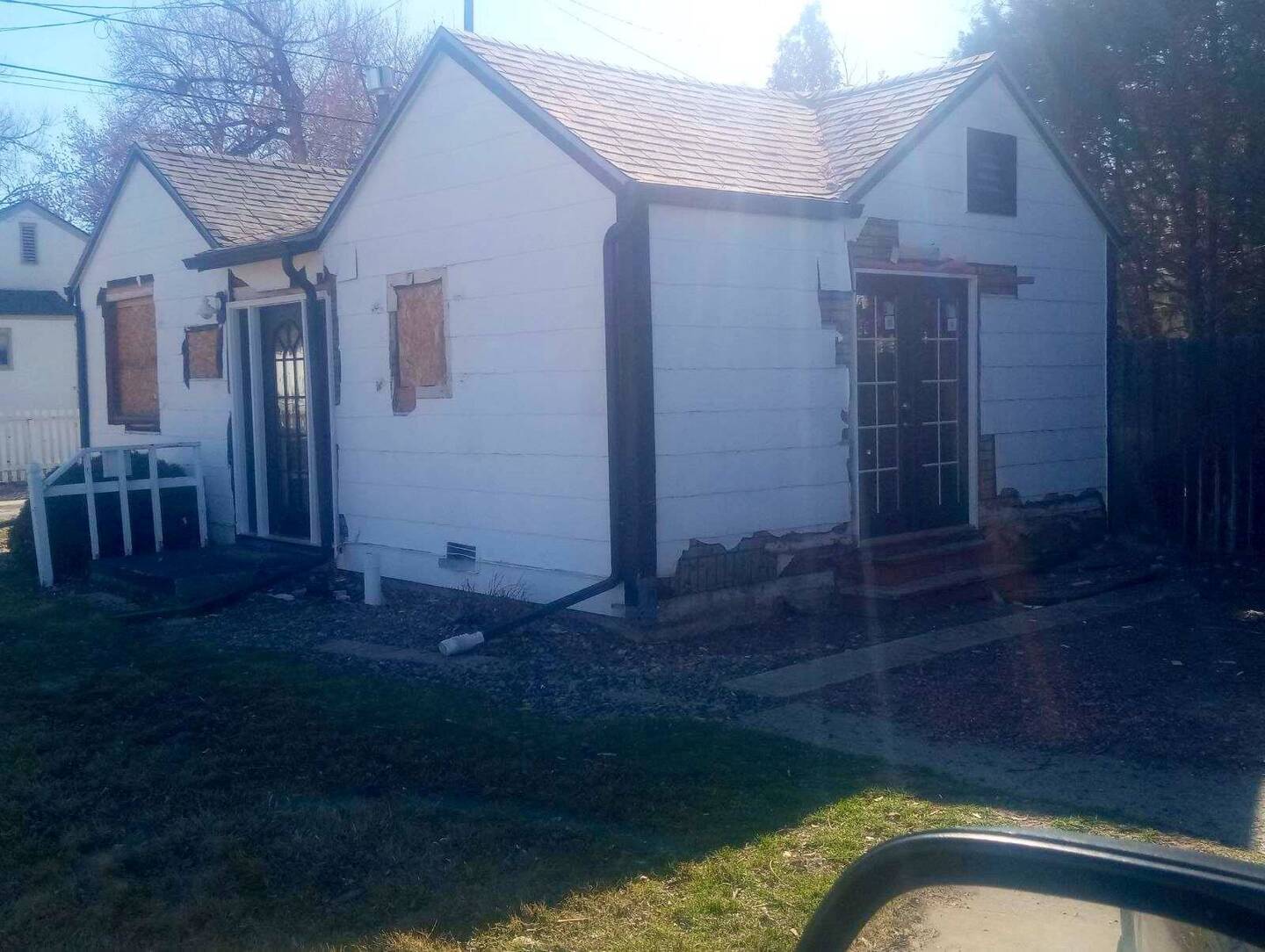 She's looking a little rough around the edges, but the front door and patio door make it more homey.