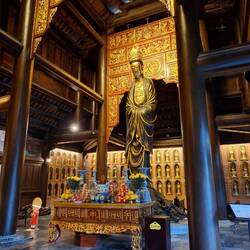 Quan Am statue from single tree