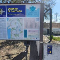 Arrow pointing down steps on the outhere side of the road!