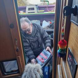Leo keeping a watchful eye on Will while he carries out a service on Rainboat's engine