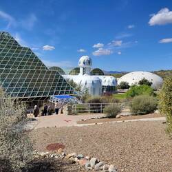 The taller structure is home to 5 biomes, or environments, including a mini-ocean and rainforest