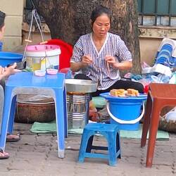 Frying tofu in precariously balanced hot oil