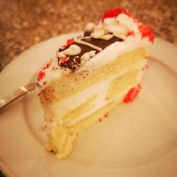 Piefe of birthday cake from another guest