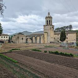 The albergue for tonight (L) is run by a brotherhood who manage the church (R) and garden, it seems.