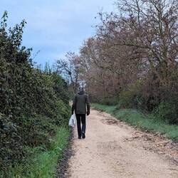 I HAVE to assume this pilgrim is getting his bag couriered town to town, it can't be a Tescos bag...