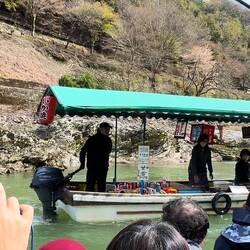 Boat selling food to us