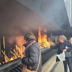 Forget lighting a votive for someone. Just throw in a handful of candlesticks 😳