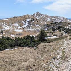 Walking on along the ridge towards the highest peak