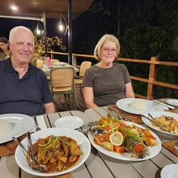 Sharon and Chris and a typical dinner.