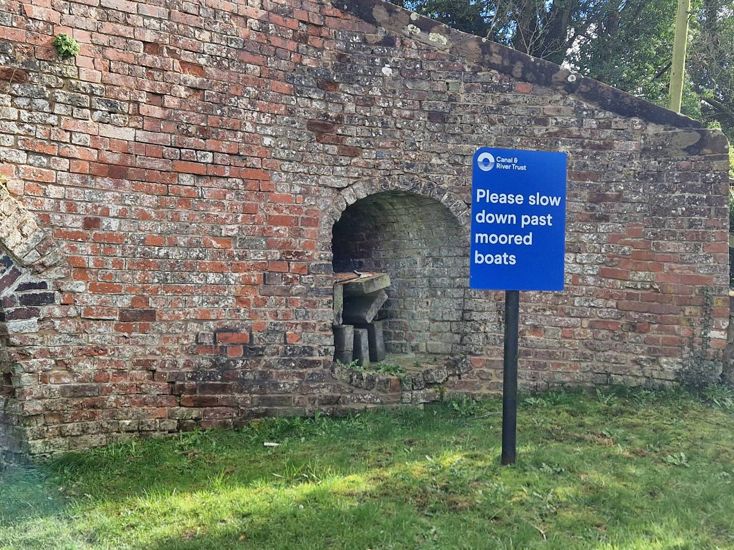 Stop planks stored in a bridge. They're placed across the canal if a section needs to be closed off