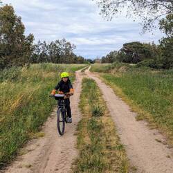 He got bored of the flat marked cycling trail, so off we went into the sand