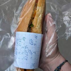 Breakfast bahn mi, wrapped in scrap maths sum paper