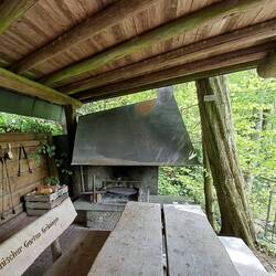 Another shelter in botanic gardens. Help yourself to logs, make fire. Can you imagine in uk