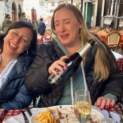 Fun laughs enjoying the French city and beverages