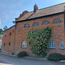 Stetchworth; the shadowed side of The Old Mill, now a private residence