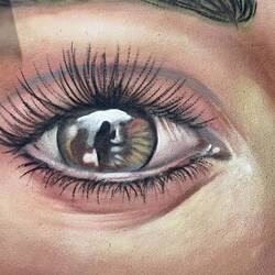 Artist is known for eye pics, with reflections in the eyeball. Beautiful.
