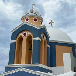 Pretty church on the side of a cliff.