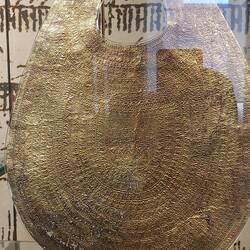 This was solid gold of a very fine thinly beaten breastplate