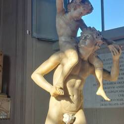 Marble statue of a father and son