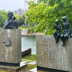 Miekichi Suzuki, children's writer. Erected 1964 as a symbol of Hiroshima's return to normal life.