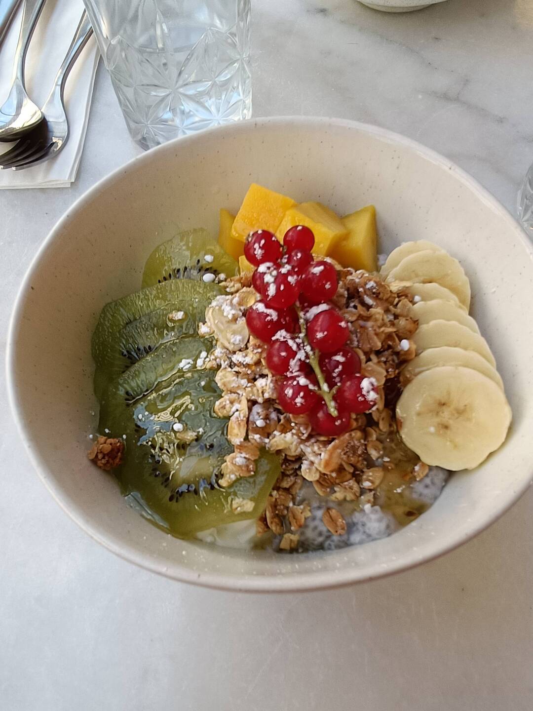 Something different than pastries for breakfast. Delicious greek yoghurt, chia seeds and fresh fruit